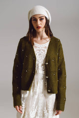 Cardigan with knitted flowers and embellished details